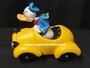 Disney Donald Duck in geel autotje beeldje  - Disney Donald Duck Driving angry In yellow Car Figurine 