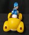 Disney Donald Duck in geel autotje beeldje  - Disney Donald Duck Driving angry In yellow Car Figurine Boxed