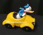 Disney Donald Duck in geel autotje beeldje  - Disney Donald Duck Driving angry In yellow Car Figurine Boxed