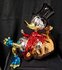 Scrooge sitting on Money Bag Chromed Replica PopArt Cartoon Comic Sculpture 