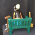 disney goofy on bench